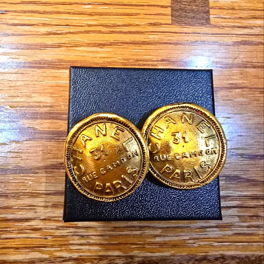 A beautiful pair of CHANEL gold Button Clip Earrings!